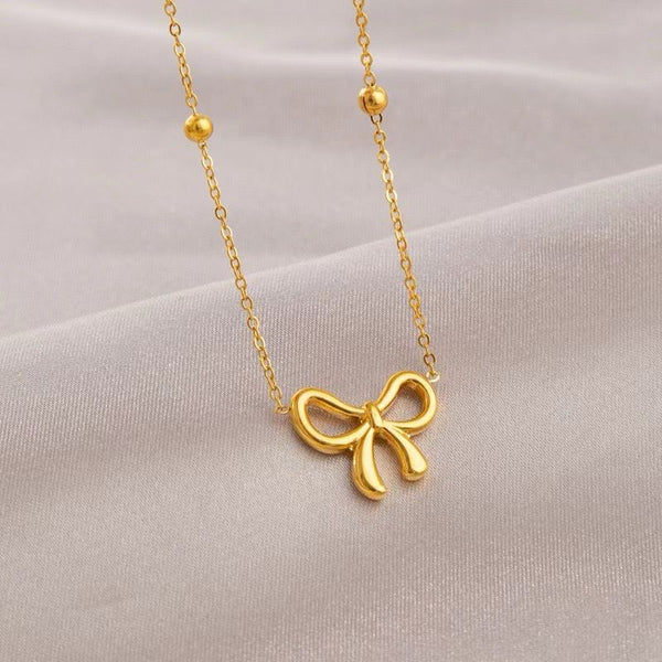 Golden Grace Anti Tarnish Infinity Bow Pendant