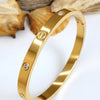 Golden Screw-Detail Crystal Bangle